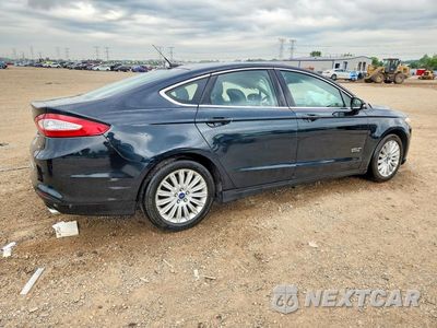 Trzecie zdjęcie samochodu z tyłu: 2014 FORD FUSION SE PHEV VIN:3FA6P0PU1ER330449 - miniatura