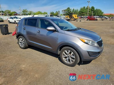 Czwarte zdjęcie samochodu z boku: 2014 KIA SPORTAGE LX VIN:KNDPBCAC5E7549601 - miniatura