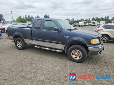 Czwarte zdjęcie samochodu z boku: 2000 FORD F150 VIN:1FTRX18L2YNA44491 - miniatura
