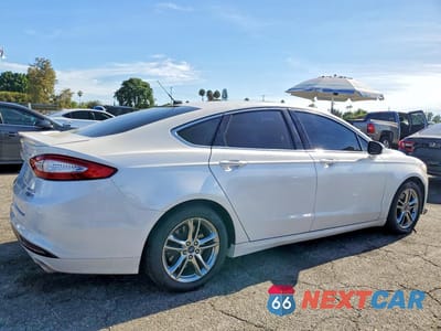 Trzecie zdjęcie samochodu z tyłu: 2016 FORD FUSION TITANIUM PHEV VIN:3FA6P0SU5GR157013 - miniatura