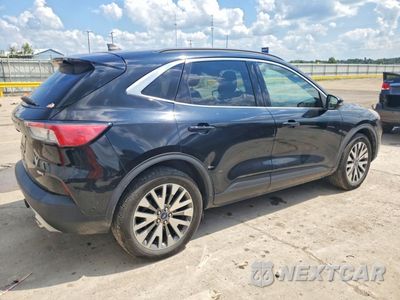 Trzecie zdjęcie samochodu z tyłu: 2020 FORD ESCAPE TITANIUM VIN:1FMCU9J92LUB15114 - miniatura