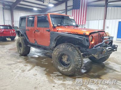 Czwarte zdjęcie samochodu z boku: 2009 JEEP WRANGLER UNLIMITED RUBICON VIN:1J4GA691X9L761649 - miniatura