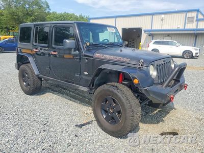 Czwarte zdjęcie samochodu z boku: 2013 JEEP WRANGLER UNLIMITED SPORT VIN:1C4BJWDG7DL618503 - miniatura