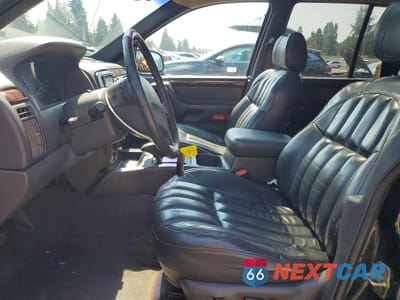 Zdjęcie 7 z 13 samochodu: 2000 JEEP GRAND CHEROKEE LIMITED VIN:1J4GW58N8YC280409 - miniatura