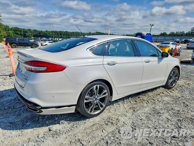 Trzecie zdjęcie samochodu z tyłu: 2017 FORD FUSION TITANIUM VIN:3FA6P0D95HR160231 - miniatura