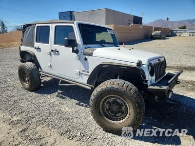 Czwarte zdjęcie samochodu z boku: 2015 JEEP WRANGLER UNLIMITED SPORT VIN:1C4BJWDG4FL641336 - miniatura