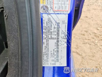 Zdjęcie 12 z 12 samochodu: 2014 FORD FIESTA ST VIN:3FADP4GXXEM195350 - miniatura