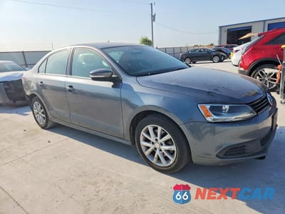 Czwarte zdjęcie samochodu z boku: 2011 VOLKSWAGEN JETTA SE VIN:3VWDZ7AJ5BM315638 - miniatura