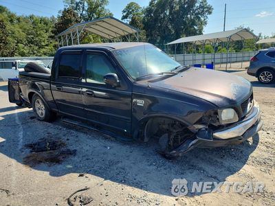 Zdjęcie 7 z 26 samochodu: 2001 FORD F150 SUPERCREW VIN:1FTRW07L41KE22364 - miniatura