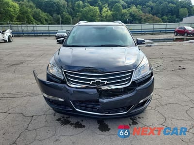 Piąte zdjęcie samochodu w środku: 2017 CHEVROLET TRAVERSE LT VIN:1GNKVHKD9HJ252335 - miniatura