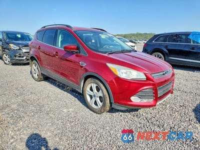 Czwarte zdjęcie samochodu z boku: 2014 FORD ESCAPE SE VIN:1FMCU0GX0EUB41814 - miniatura
