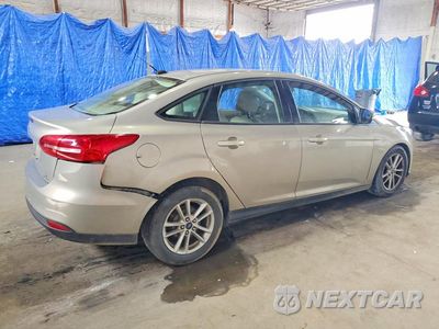 Trzecie zdjęcie samochodu z tyłu: 2015 FORD FOCUS SE VIN:1FADP3F26FL311677 - miniatura