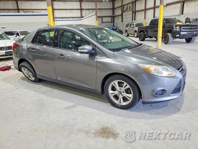 Czwarte zdjęcie samochodu z boku: 2014 FORD FOCUS SE VIN:1FADP3F23EL312493 - miniatura