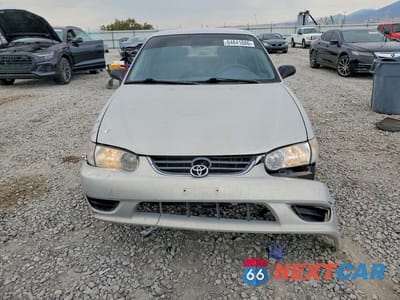 Piąte zdjęcie samochodu w środku: 2001 TOYOTA COROLLA CE VIN:1NXBR12E71Z538617 - miniatura