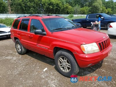 Czwarte zdjęcie samochodu z boku: 1999 JEEP GRAND CHEROKEE LIMITED VIN:1J4GW68NXXC702510 - miniatura