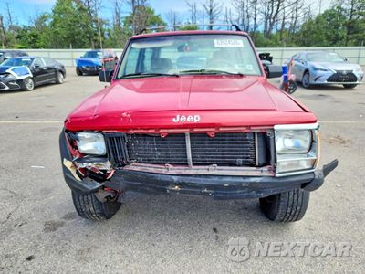 Piąte zdjęcie samochodu w środku: 1992 JEEP CHEROKEE SPORT VIN:1J4FJ87S4NL248653 - miniatura
