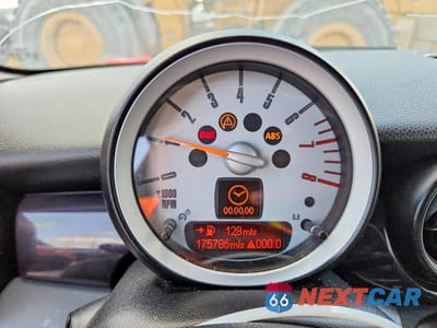 Zdjęcie 11 z 14 samochodu: 2009 MINI COOPER VIN:WMWMF33509TU70997 - miniatura