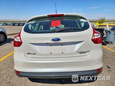Zdjęcie 6 z 12 samochodu: 2013 FORD FOCUS TITANIUM VIN:1FADP3N24DL184068 - miniatura