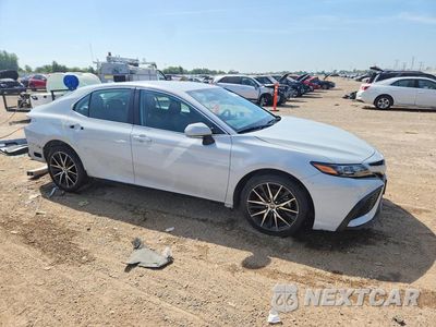 Czwarte zdjęcie samochodu z boku: 2024 TOYOTA CAMRY SE VIN:4T1G11AK1RU226048 - miniatura