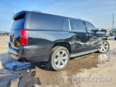 Trzecie zdjęcie samochodu z tyłu: 2020 CHEVROLET SUBURBAN K1500 PREMIER VIN:1GNSKJKC3LR278544 - miniatura