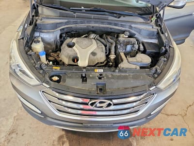 Zdjęcie 12 z 13 samochodu: 2013 HYUNDAI SANTA FE SPORT 2.0T VIN:5XYZUDLA8DG012307 - miniatura