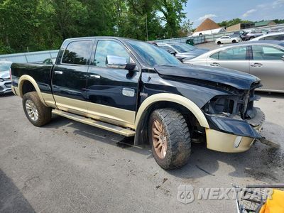 Czwarte zdjęcie samochodu z boku: 2014 RAM 1500 LONGHORN VIN:1C6RR7WT6ES371741 - miniatura