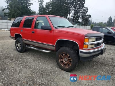 Czwarte zdjęcie samochodu z boku: 1998 CHEVROLET TAHOE K1500 VIN:1GNEK13R7WJ338778 - miniatura