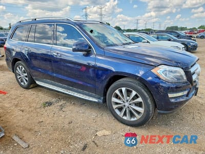 Czwarte zdjęcie samochodu z boku: 2016 MERCEDES-BENZ GL 450 4MATIC VIN:4JGDF6EE4GA703043 - miniatura