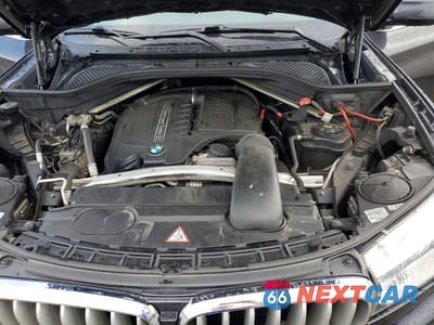 Zdjęcie 12 z 13 samochodu: 2014 BMW X5 SDRIVE35I VIN:5UXKR2C57E0H33415 - miniatura