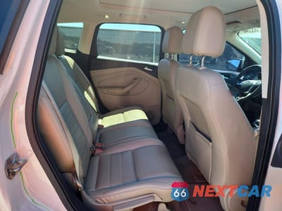 Zdjęcie 10 z 12 samochodu: 2014 FORD ESCAPE TITANIUM VIN:1FMCU0J94EUE20287 - miniatura