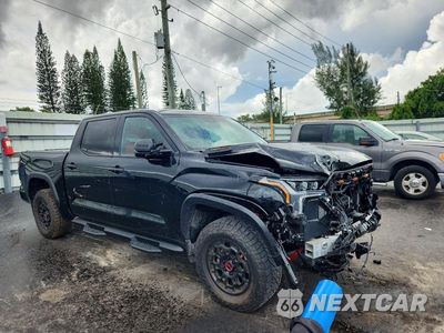 Czwarte zdjęcie samochodu z boku: 2024 TOYOTA TUNDRA TRD PRO HV VIN:5TFPC5DB9RX067411 - miniatura