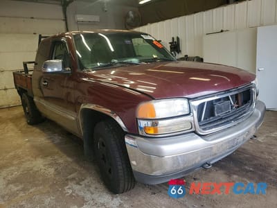 Czwarte zdjęcie samochodu z boku: 2000 GMC NEW SIERRA K1500 VIN:1GTEK19T1YZ263009 - miniatura