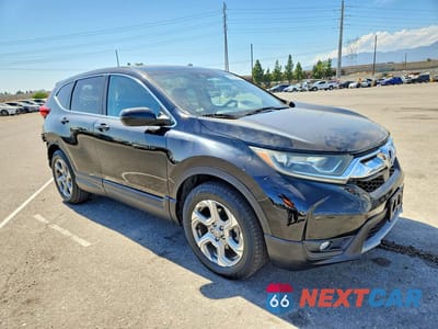 Czwarte zdjęcie samochodu z boku: 2017 HONDA CR-V EXL VIN:7FARW1H89HE023851 - miniatura