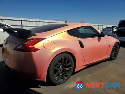 Trzecie zdjęcie samochodu z tyłu: 2016 NISSAN 370Z BASE VIN:JN1AZ4EH8GM937250 - miniatura