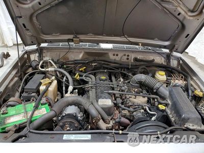 Zdjęcie 12 z 14 samochodu: 2001 JEEP CHEROKEE SPORT VIN:1J4FT48S91L607037 - miniatura