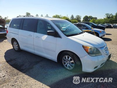 Czwarte zdjęcie samochodu z boku: 2010 HONDA ODYSSEY EXL VIN:5FNRL3H65AB062327 - miniatura
