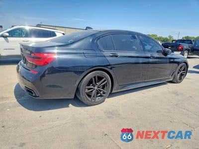 Trzecie zdjęcie samochodu z tyłu: 2019 BMW 750 XI VIN:WBA7F2C51KB239416 - miniatura