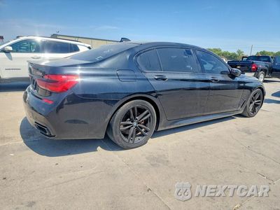 Trzecie zdjęcie samochodu z tyłu: 2019 BMW 750 XI VIN:WBA7F2C51KB239416 - miniatura