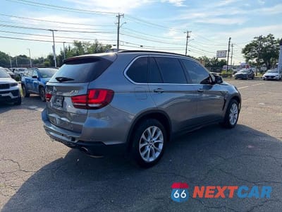 Czwarte zdjęcie samochodu z boku: 2016 BMW X5 XDRIVE35I VIN:5UXKR0C52G0U10569 - miniatura