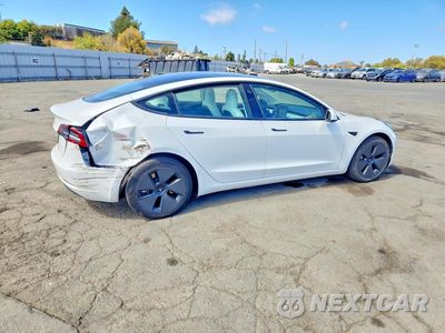 Trzecie zdjęcie samochodu z tyłu: 2022 TESLA MODEL 3 VIN:5YJ3E1EA1NF330602 - miniatura