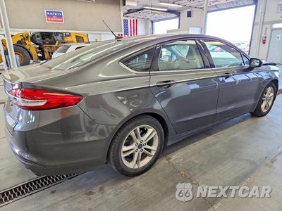 Trzecie zdjęcie samochodu z tyłu: 2018 FORD FUSION SE VIN:3FA6P0HDXJR205247 - miniatura