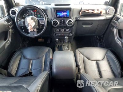 Zdjęcie 8 z 13 samochodu: 2013 JEEP WRANGLER UNLIMITED SAHARA VIN:1C4HJWEG0DL656602 - miniatura