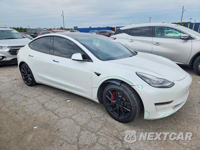 Czwarte zdjęcie samochodu z boku: 2020 TESLA MODEL 3 VIN:5YJ3E1EC9LF624733 - miniatura