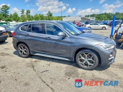 Czwarte zdjęcie samochodu z boku: 2016 BMW X1 XDRIVE28I VIN:WBXHT3C31GP882429 - miniatura
