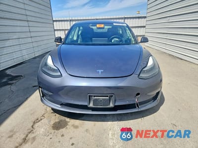 Piąte zdjęcie samochodu w środku: 2022 TESLA MODEL 3 VIN:5YJ3E1EB8NF299034 - miniatura