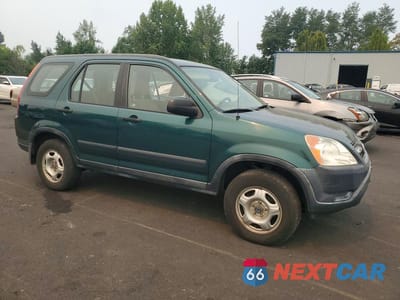 Czwarte zdjęcie samochodu z boku: 2002 HONDA CR-V LX VIN:JHLRD78552C043645 - miniatura