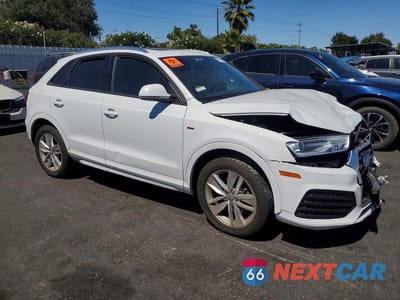 Czwarte zdjęcie samochodu z boku: 2018 AUDI Q3 VIN:WA1ECCFS0JR020957 - miniatura
