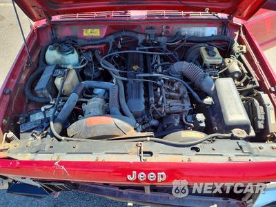 Zdjęcie 12 z 13 samochodu: 1992 JEEP CHEROKEE SPORT VIN:1J4FJ87S4NL248653 - miniatura