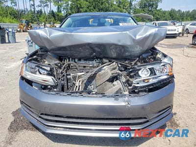 Piąte zdjęcie samochodu w środku: 2017 VOLKSWAGEN JETTA SE VIN:3VWDB7AJ9HM322007 - miniatura