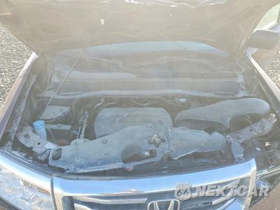 Zdjęcie 12 z 13 samochodu: 2014 HONDA PILOT LX VIN:5FNYF4H2XEB030341 - miniatura